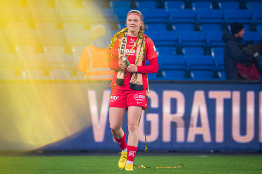 Signe Gaupset of Brann celebrates with the trophy