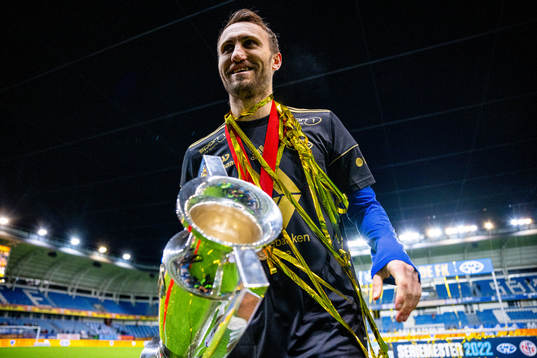 Magnus Wolff Eikrem of Molde celebrates with the trophy