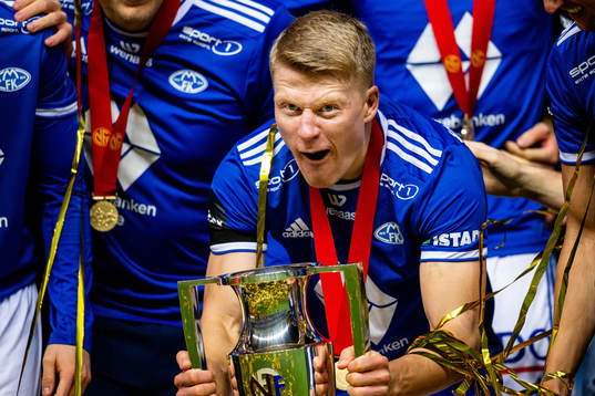 Kristian Eriksen of Molde celebrate with the trophy