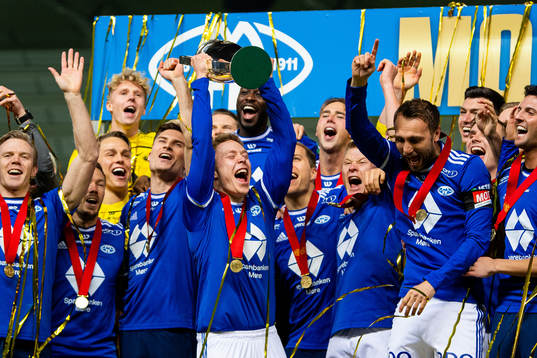 Ola Brynhildsen, Magnus Wolff Eikrem and players of Molde