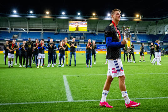 Magnus Retsius Grødem of Molde celebrates with the trophy