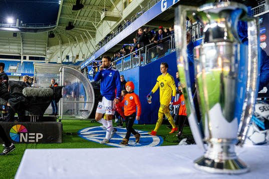 Magnus Wolff Eikrem of Molde enters the pitch
