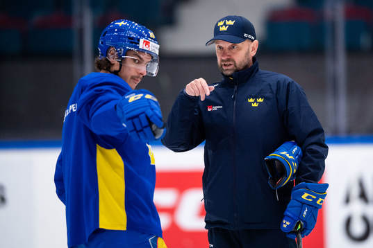 André Petersson and assistant coach Mikael Karlberg of