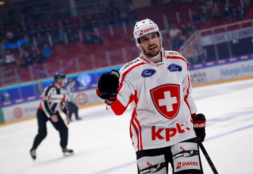 Damien Riat of Switzerland celebrate