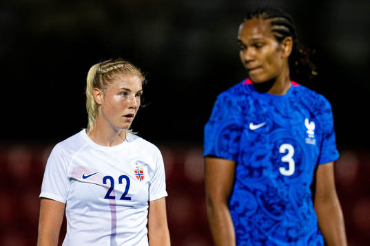 Sophie Roman Haug of Norway and Wendie Renard of France