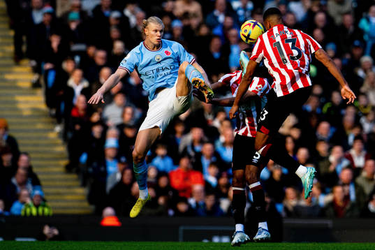 Erling Braut Haaland of Manchester City and Mathias Zanka
