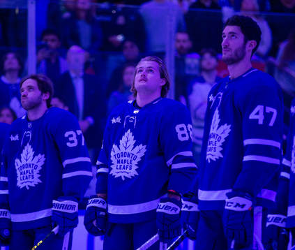 William Nylander of the Toronto Maple Leafs watches a video