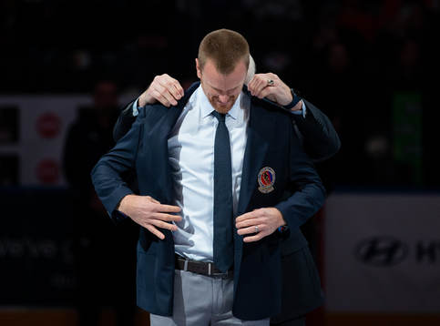 Hockey Hall of Fame Member Daniel Sedin receives his