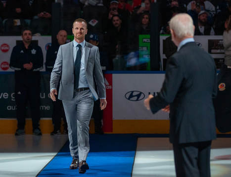 Hockey Hall of Fame Member Daniel Sedin receives his