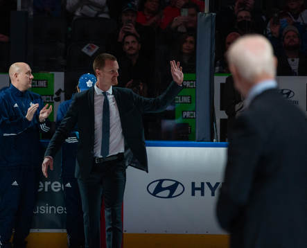 Hockey Hall of Fame Member Henrik Sedin receives his