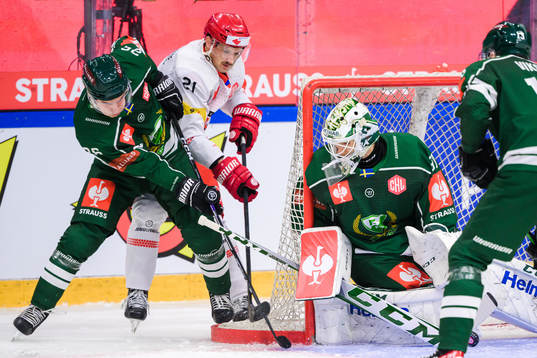 Joel Nyström and goaltender Dennis Hildeby  of Färjestad