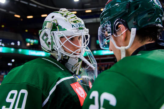goaltender Matthew Tomkins  and Joel Nyström of Färjestad