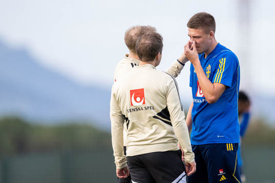 Emil Holm of the Swedish national football team in pain