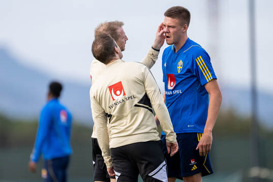 Emil Holm of the Swedish national football team in pain