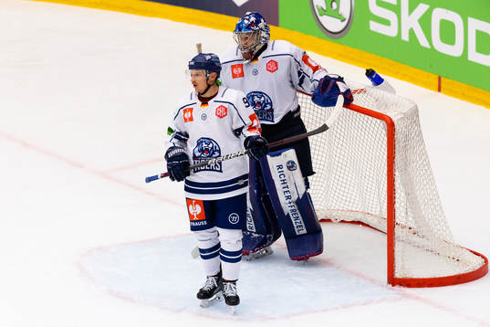 Marcel Brandt and goalkeeper Manuel Florian of Straubing