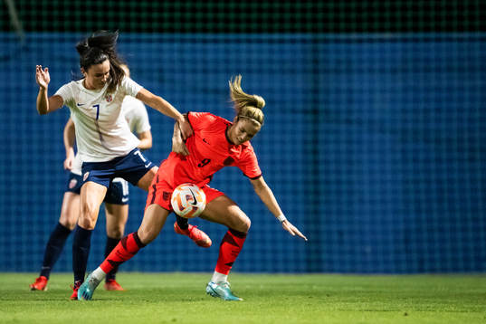 Ingrid Syrstad Engen of Norway and Rachel Daly of England
