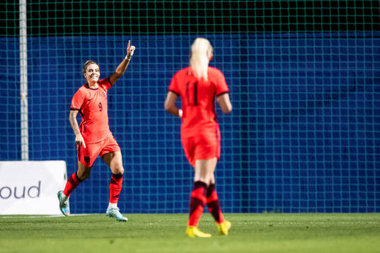 Rachel Daly of England celebrates scoring 1-0