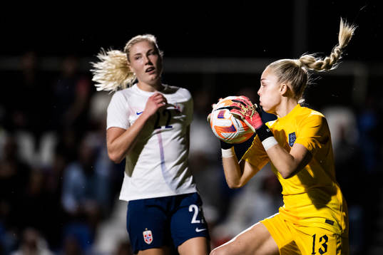 goalkeeper Ellie Roebuck of England and Sophie Roman Haug