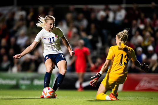 Sophie Roman Haug of Norway and goalkeeper Ellie Roebuck of