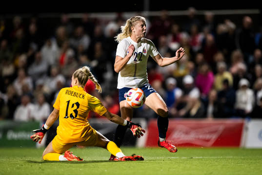 Sophie Roman Haug of Norway and goalkeeper Ellie Roebuck of