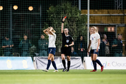 Anja Sønstevold of Norway receives a red card from Referee