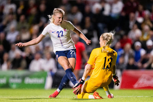Sophie Roman Haug of Norway against goalkeeper Ellie