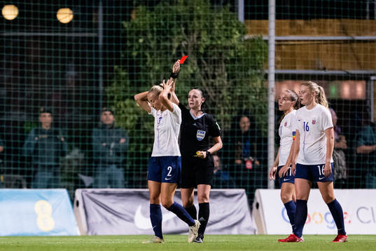 Anja Sønstevold of Norway receives a red card from Referee