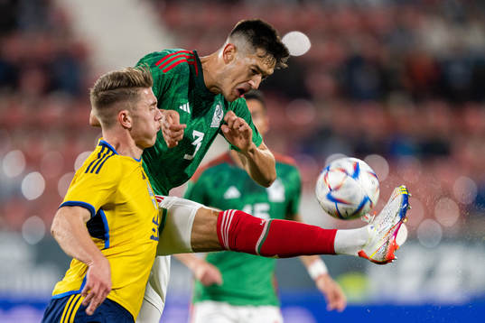Viktor Gyökeres of Sweden and Cesar Montes of Mexico