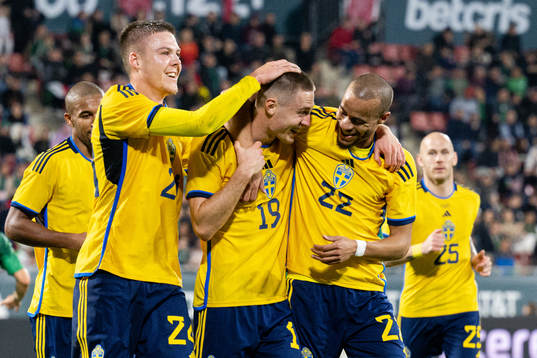 Emil Holm , Mattias Svanberg and Robin Quaison of Sweden