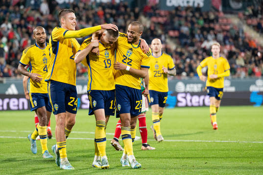 Emil Holm , Mattias Svanberg and Robin Quaison of Sweden