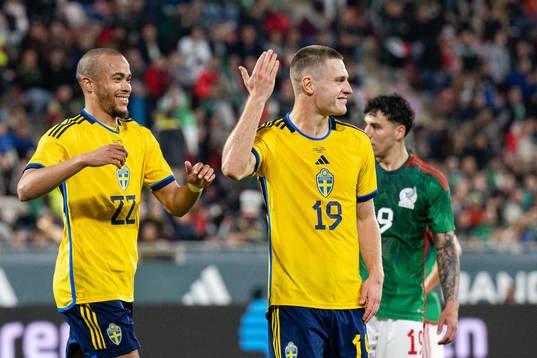 Robin Quaison and Mattias Svanberg of Sweden celebrate the