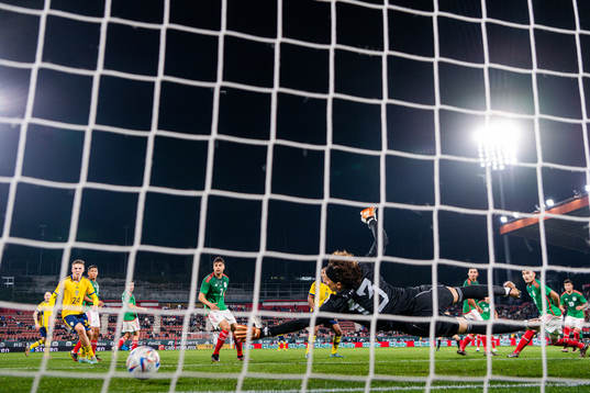 Mattias Svanberg of Sweden scores the 1-2 goal behind