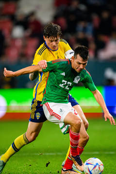 Victor Nilsson Lindelöf of Sweden and Hirving Lozano of
