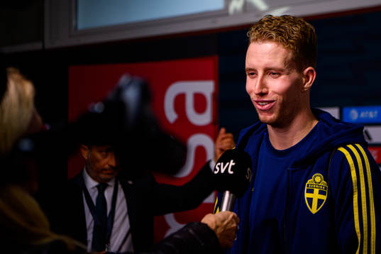 Samuel Gustafson of Sweden is interviewed by the media