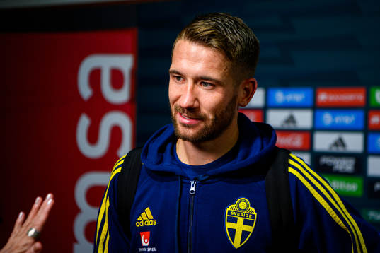 Marcus Rohdén of Sweden is interviewed by the media
