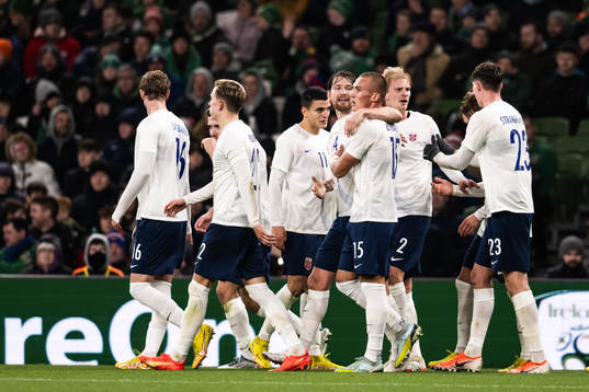 Leo Skiri Østigård of Norway celebrate with team mates