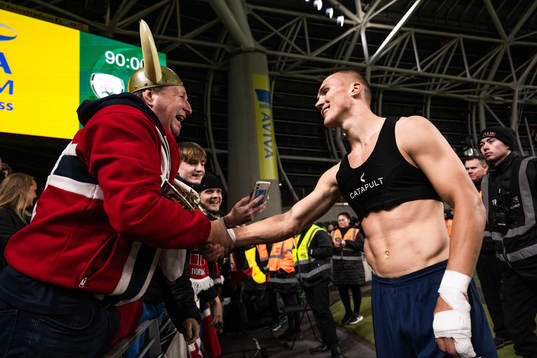 Leo Skiri Østigård of Norway gives away his shirt to