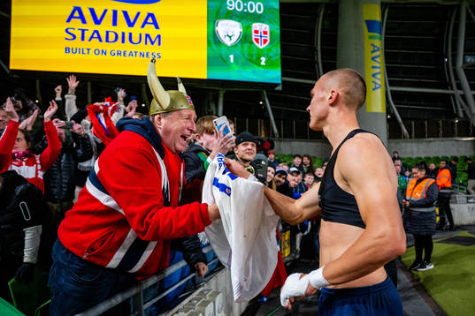 Leo Skiri Østigård of Norway gives away his shirt to