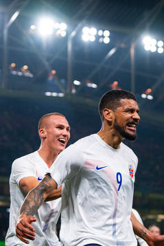 Ohi Omoijuanfo of Norway celebrates with teammate Leo Skiri