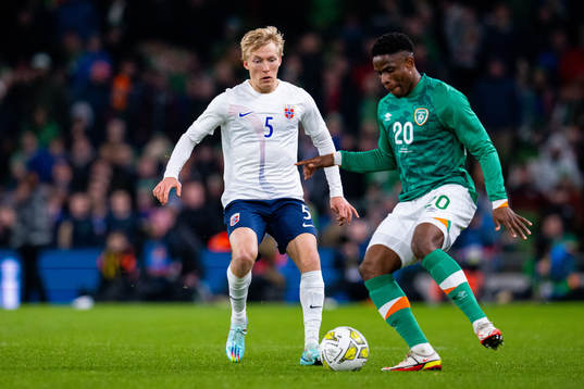 Birger Meling of Norway and Chiedozie Ogbene of Ireland
