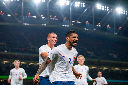 Ohi Omoijuanfo of Norway celebrates with teammate Leo Skiri