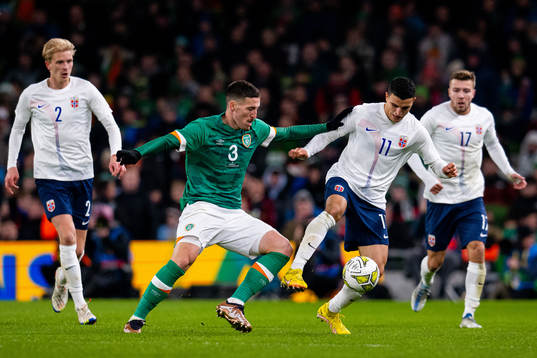 Matt Doherty of Ireland and Mohamed Elyounoussi of Norway