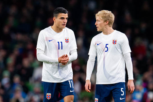 Mohamed Elyounoussi and Birger Meling of Norway