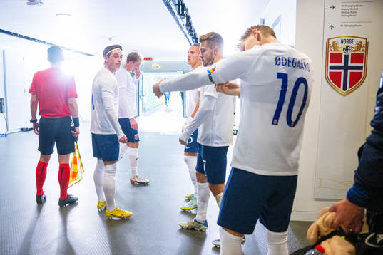 Patrick Berg and Martin Ødegaard of Norway at half-time