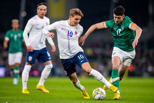 Martin Ødegaard of Norway and Callum O'Dowda of Ireland