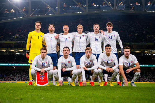 The starting eleven of Norway pose for a team photo