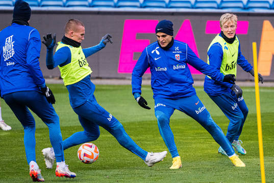 Leo Skiri Østigård and Mohamed Elyounoussi of the