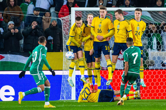 Riyad Mahrez of Algeria with a free kick against Mattias