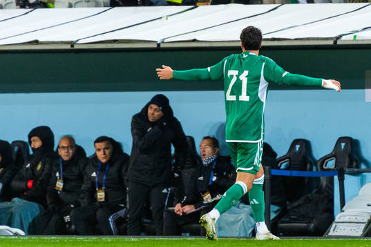 Ramy Bensebaini of Algeria reacts
