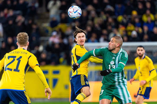Kristoffer Olsson of Sweden and Islam Slimani of Algeria